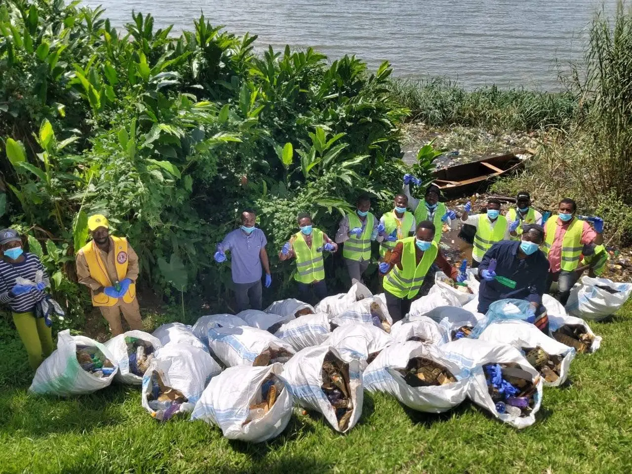 Cleaning the shores of Lake Kivu.
